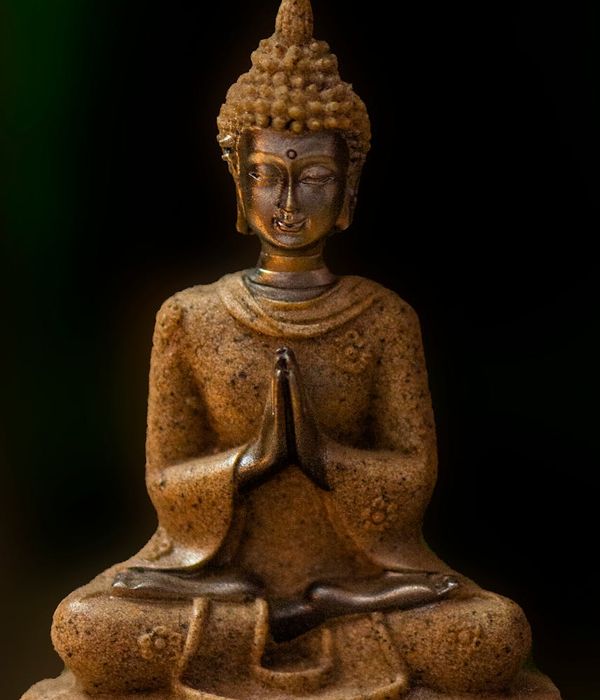 Ancient scroll with symbols representing yoga philosophy.